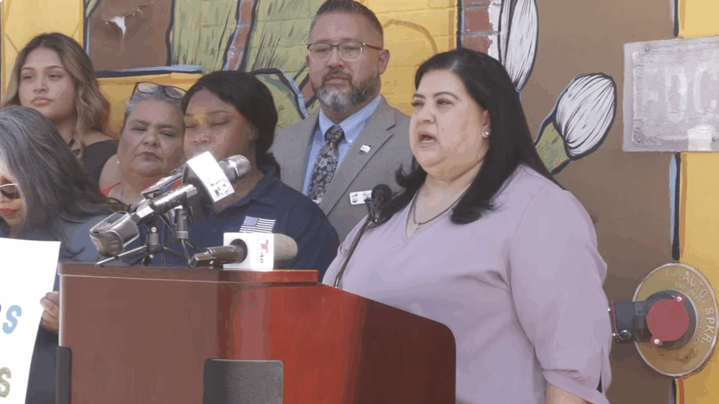 Ƶ staff and local advocates speak at a podium.